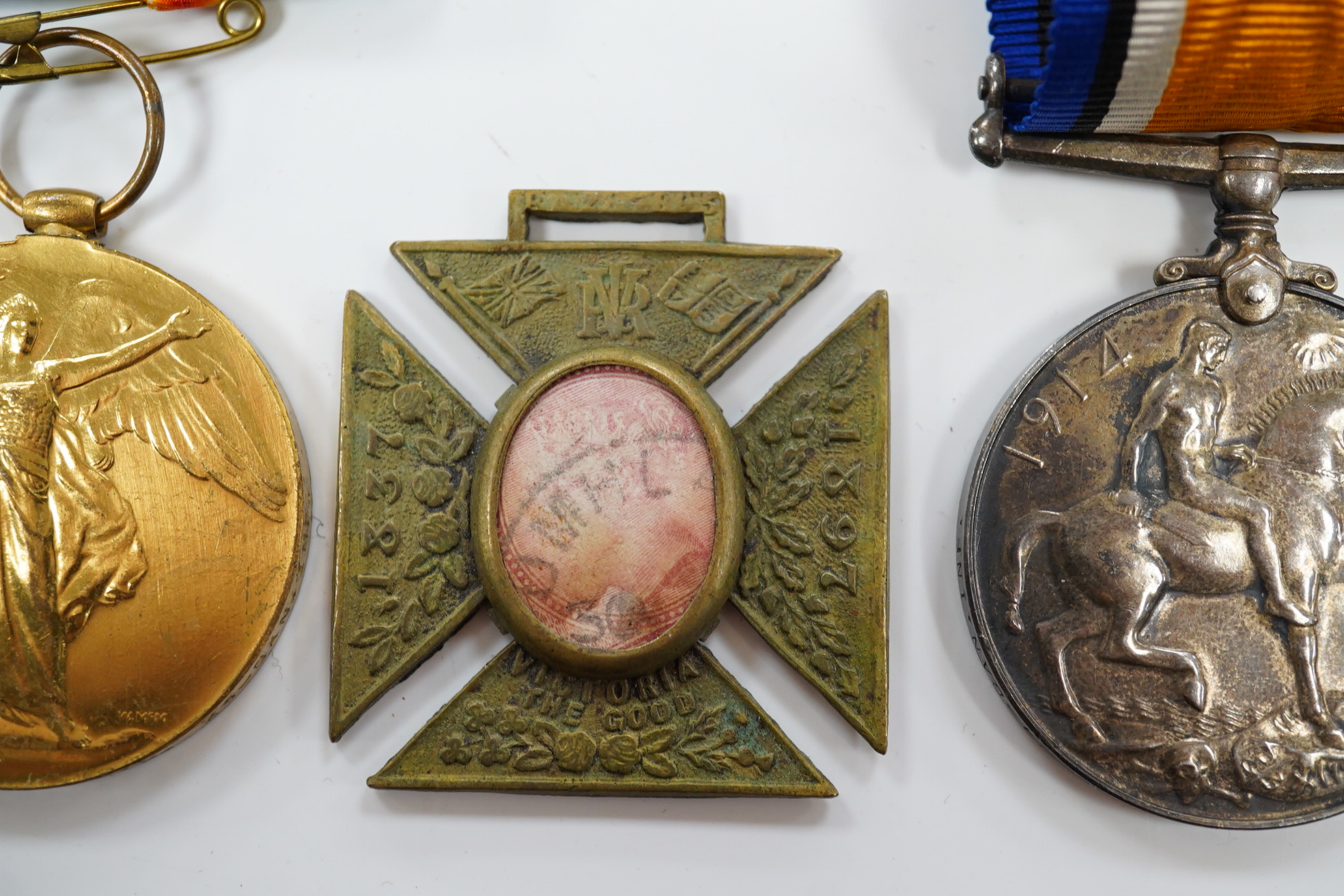 A First World War middle group awarded to A. SJT. E.E. Bogardis 24-CAN. INF. comprising of a medal pair and an 1897 Diamond Jubilee medal for Queen Victoria. Condition - poor to fair